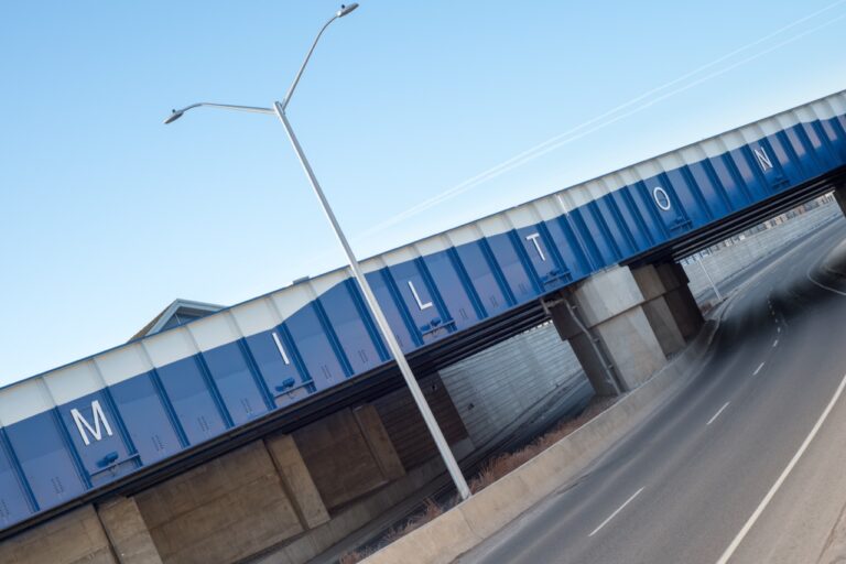 Main Street Milton Ontario, Halton Region under path rail road ideal for travel to Ontario signs